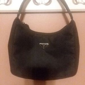 It’s a Prada purse small nylon bag